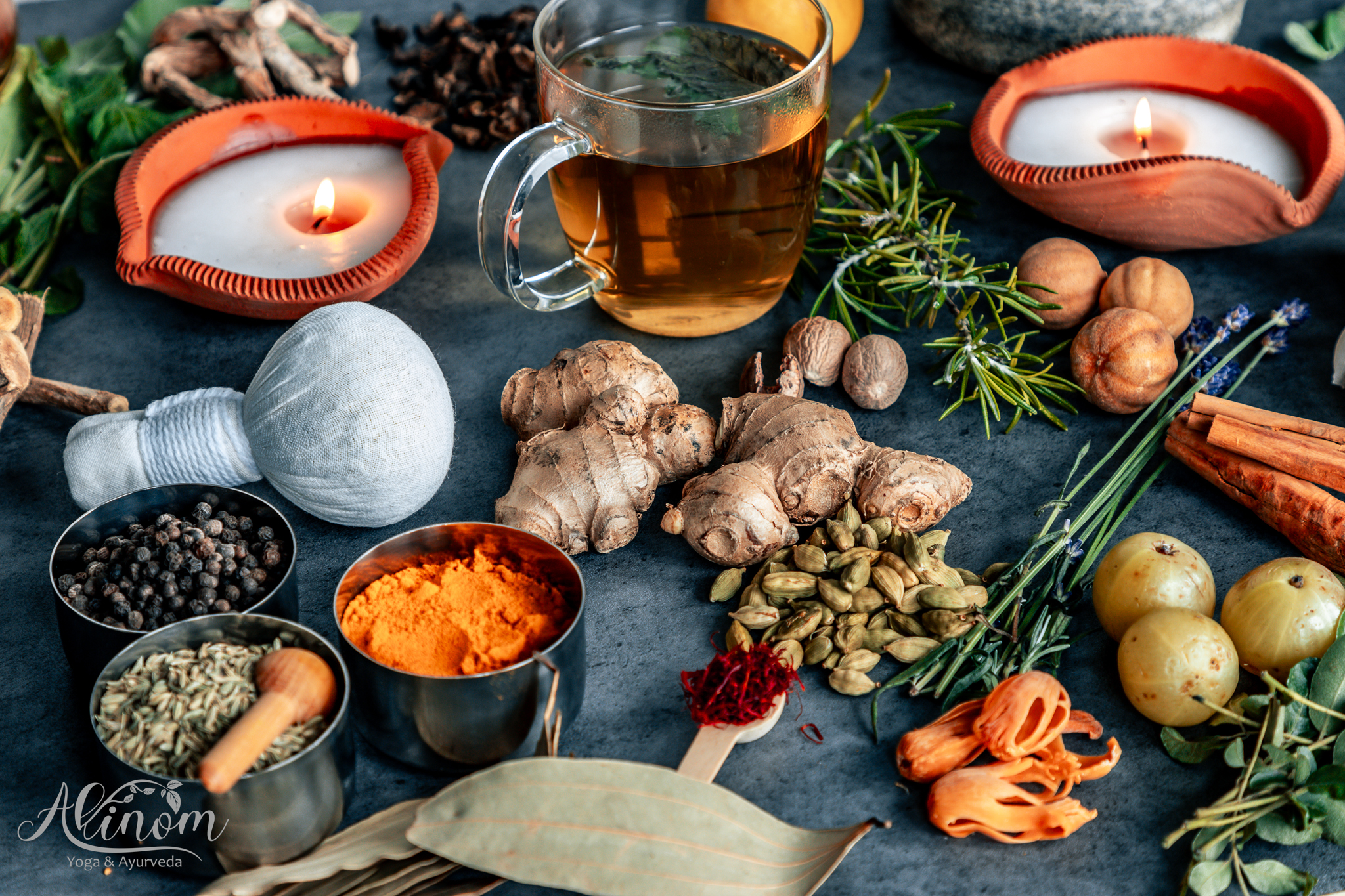 a group of spices and herbs on a table